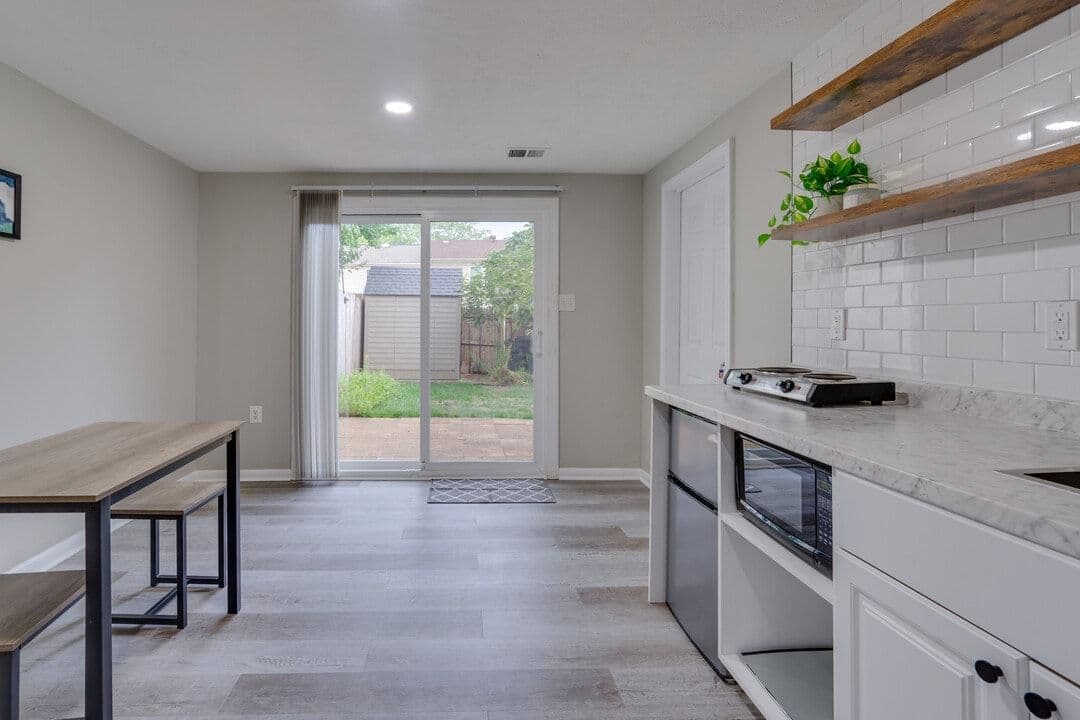 Basement apartment kitchenette and dining space at 13809 Newport Ln